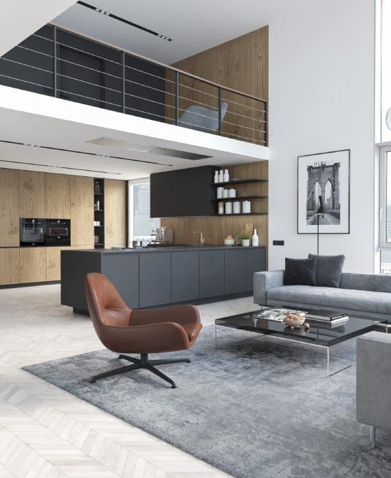 Gold Standard Builders A living room with a couch, chair and table.